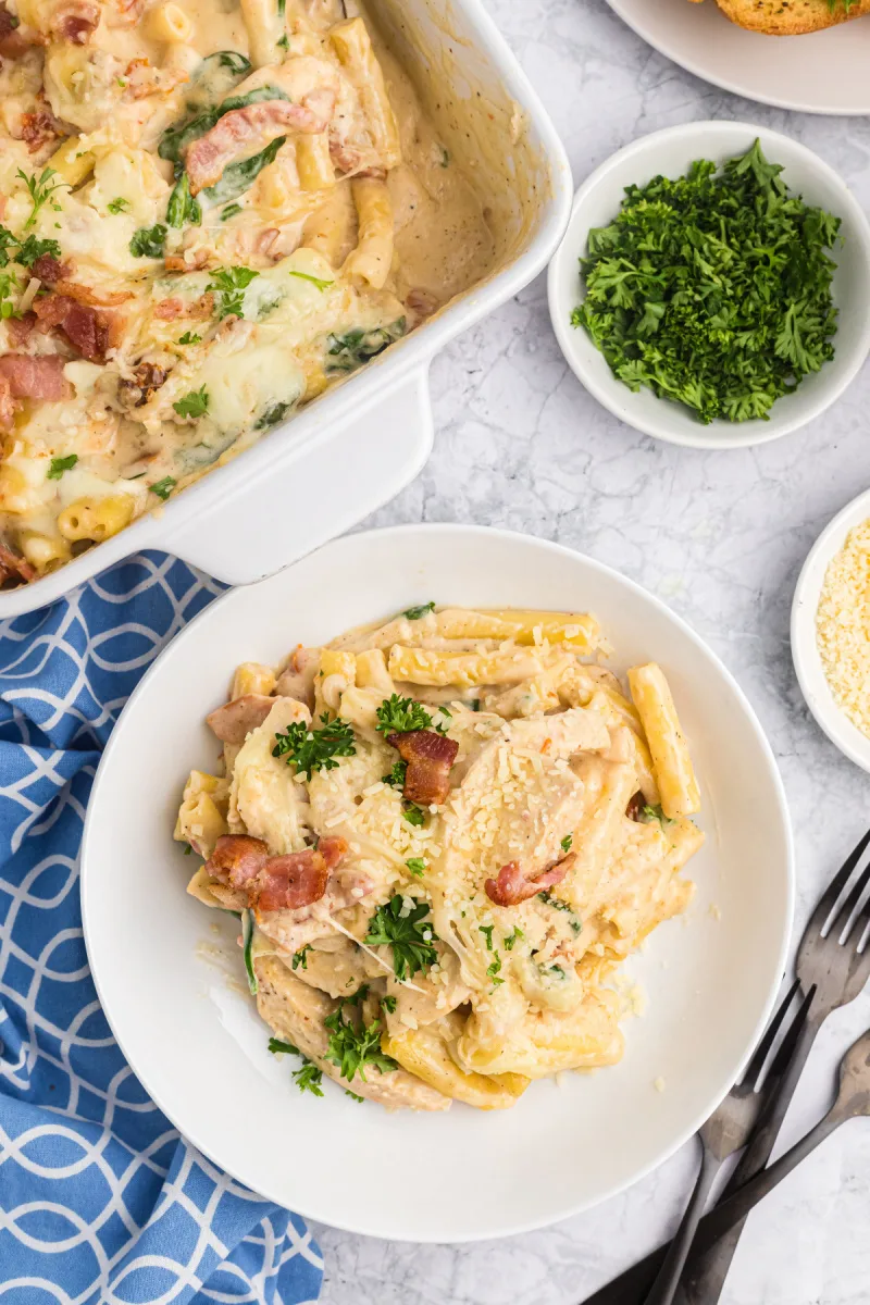 serving of creamy tuscan chicken pasta bake on plate
