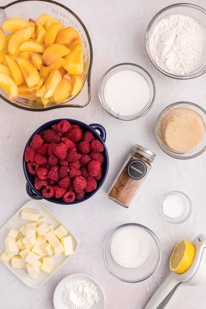 ingredients displayed for making raspberry peach crumble