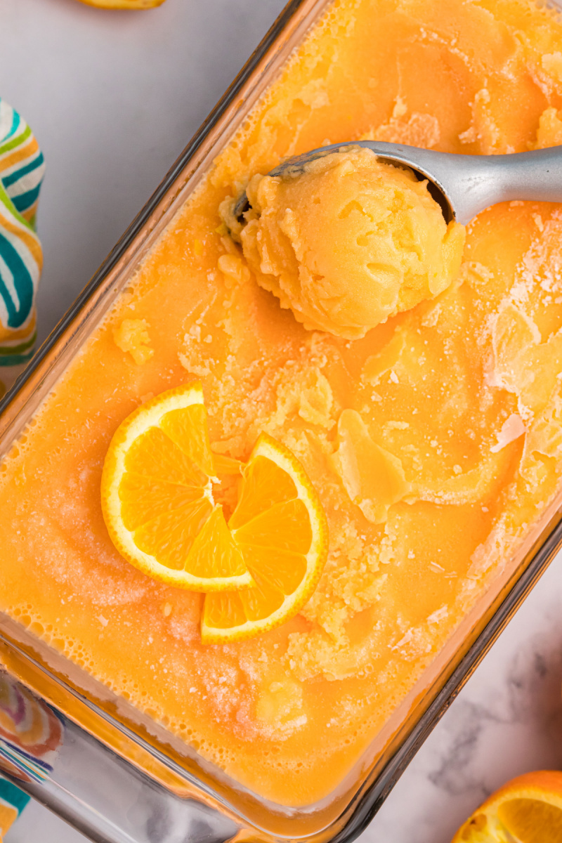 pan filled with orange sherbet