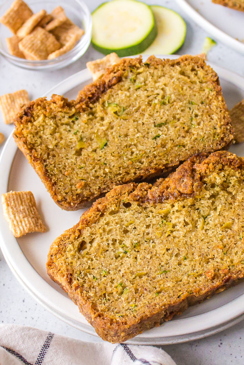 two slices cinnamon toast crunch zucchini bread on plate