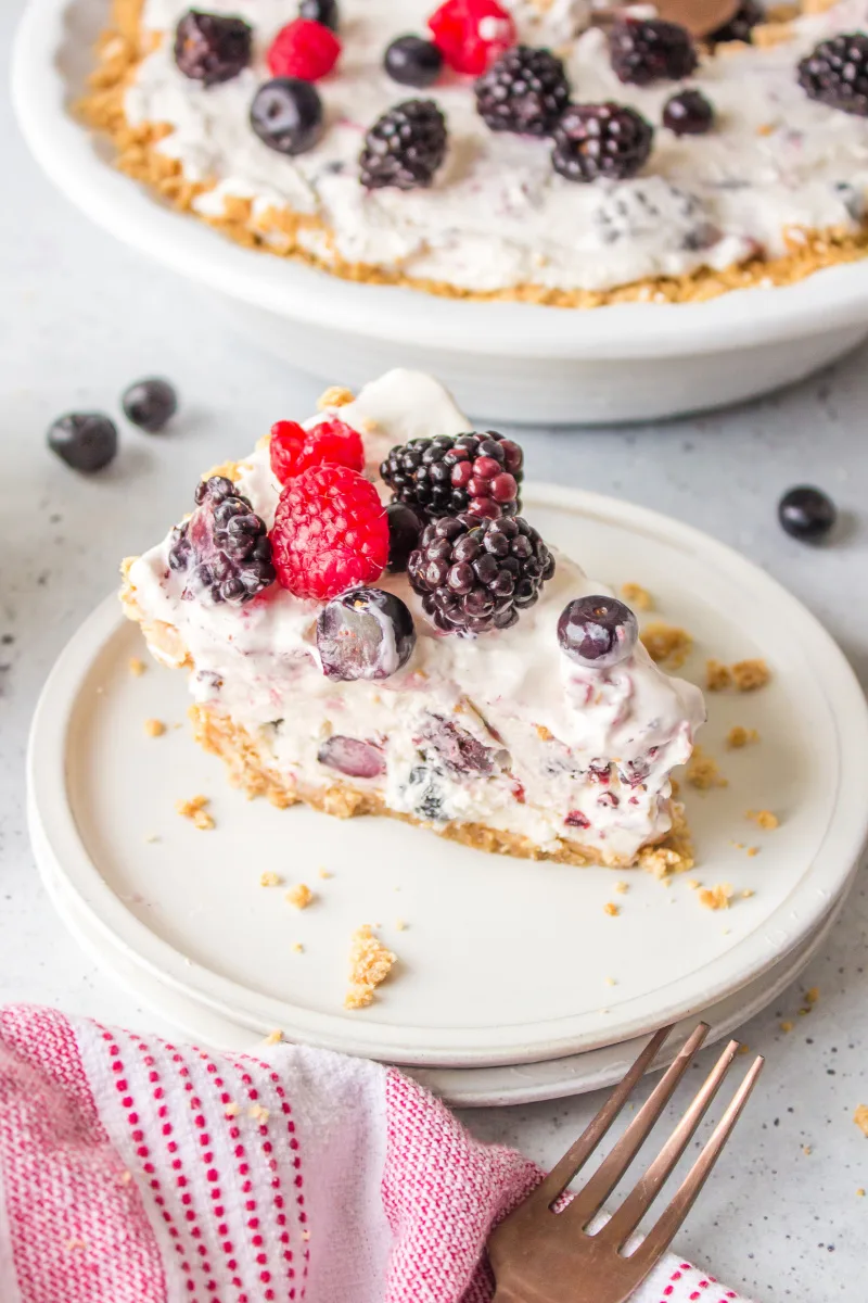 slice of easy no bake berry pie on plate