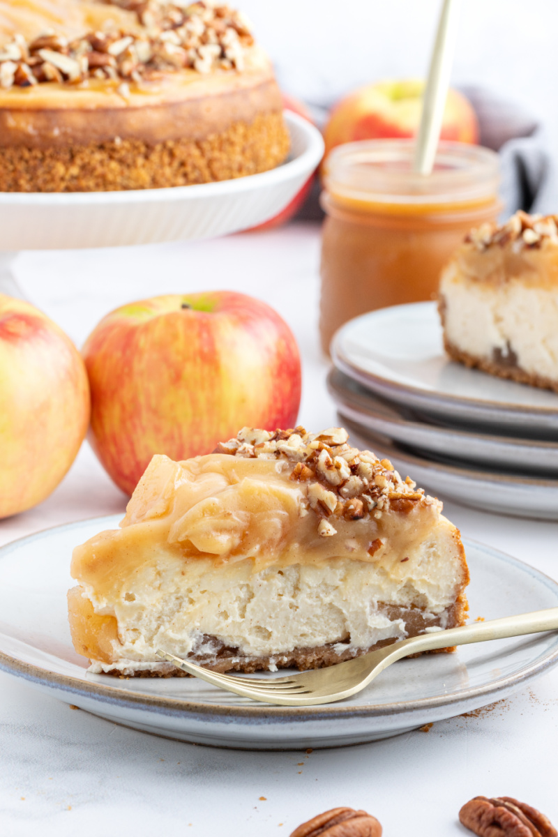 slice of caramel apple cheesecake on plate