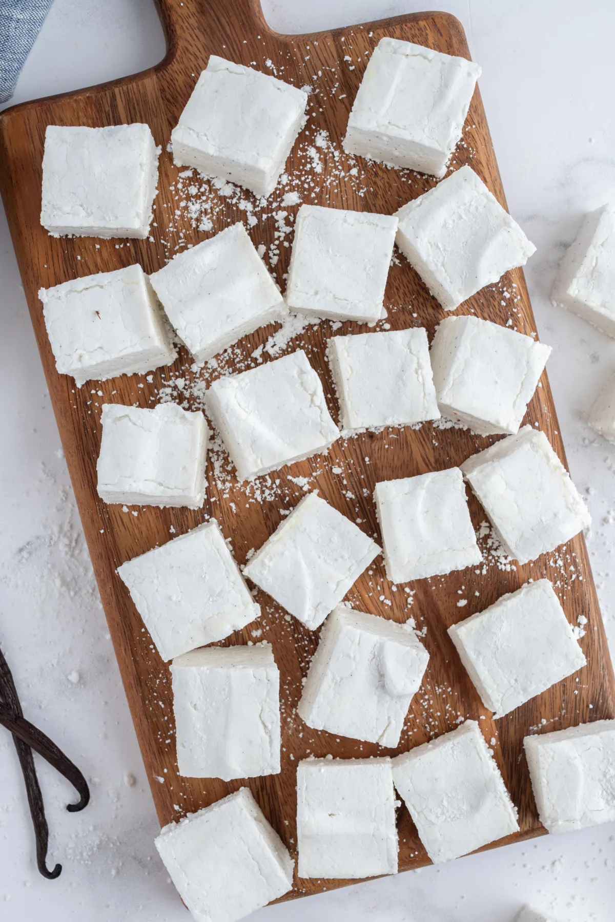 overhead shot of homemade marshmallows on a cutting board
