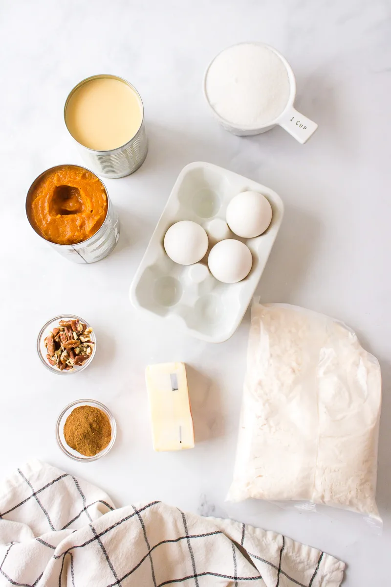 ingredients displayed for making pumpkin dump cake