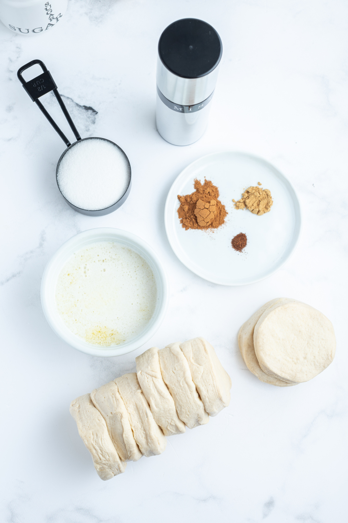 ingredients displayed for making air fryer canned biscuit donuts