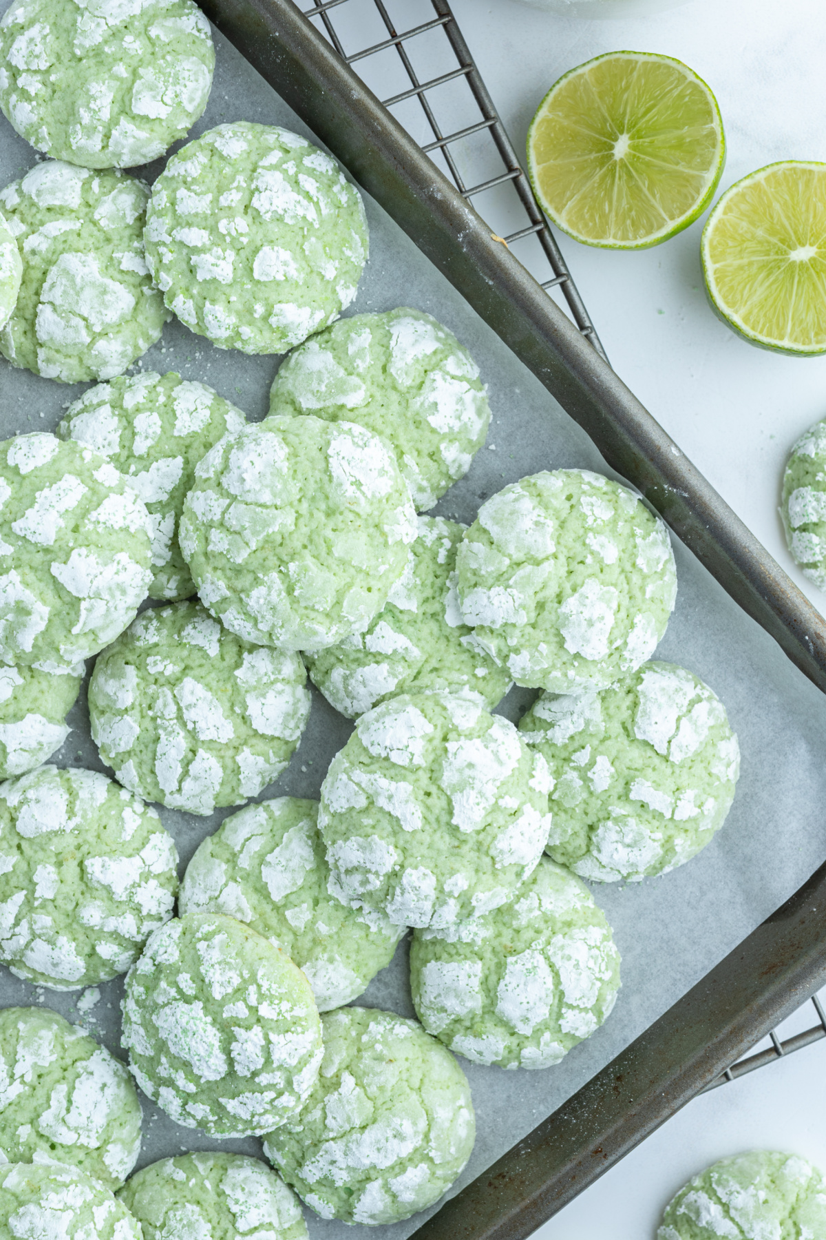 lime crackle cookies on baking sheet