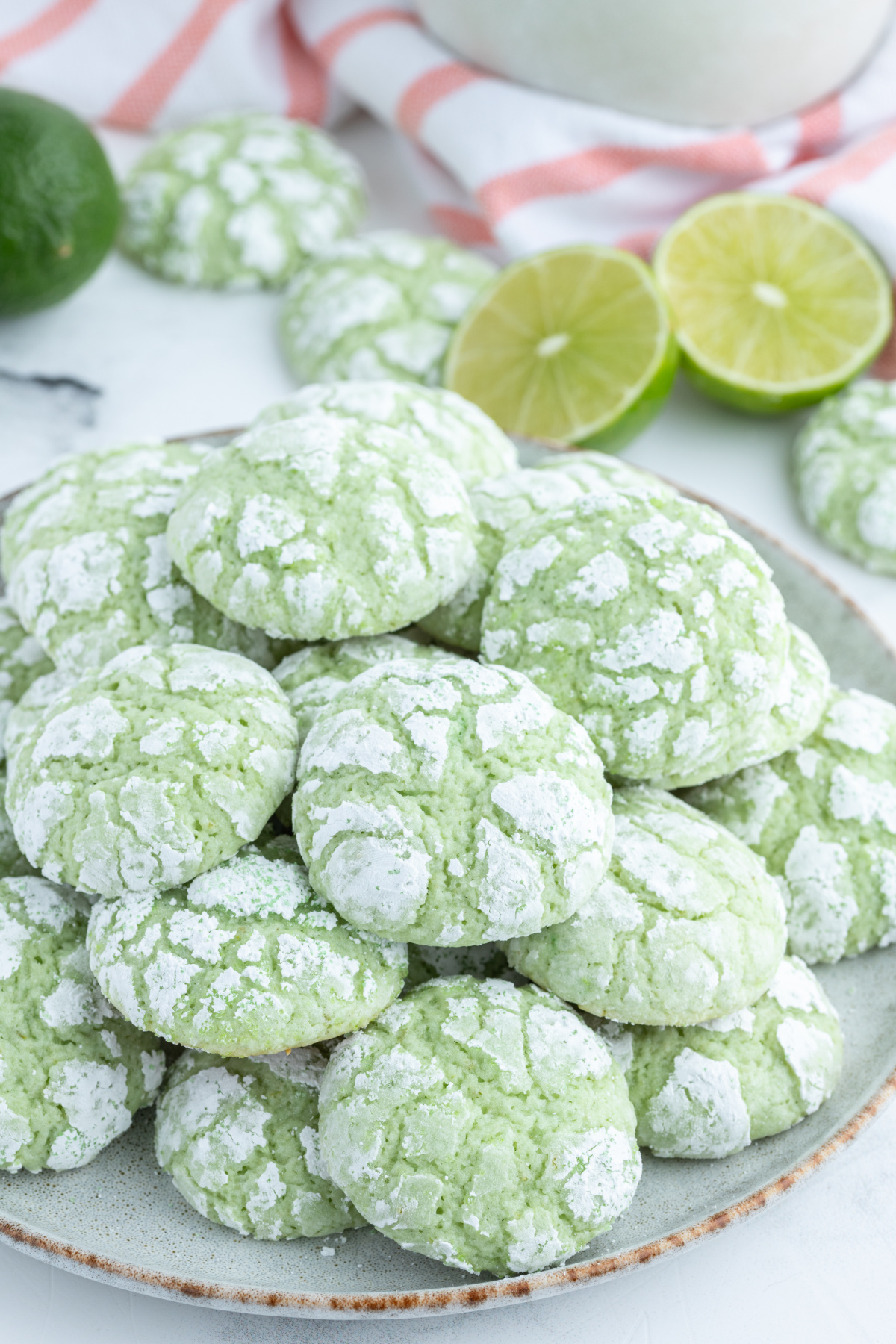 platter of stacked lime crackle cookies