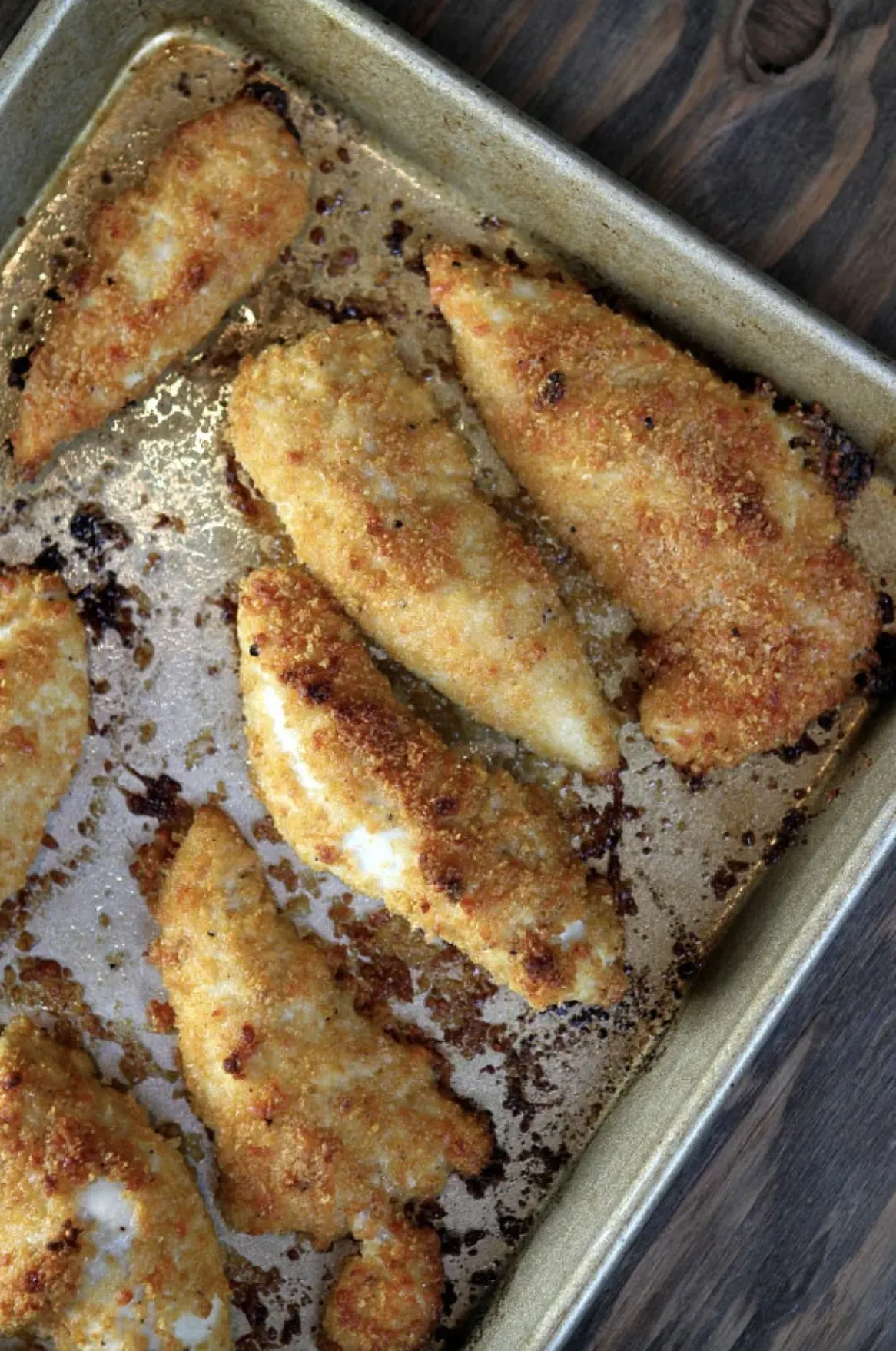 Baked Parmesan Chicken Tenders on a baking sheet