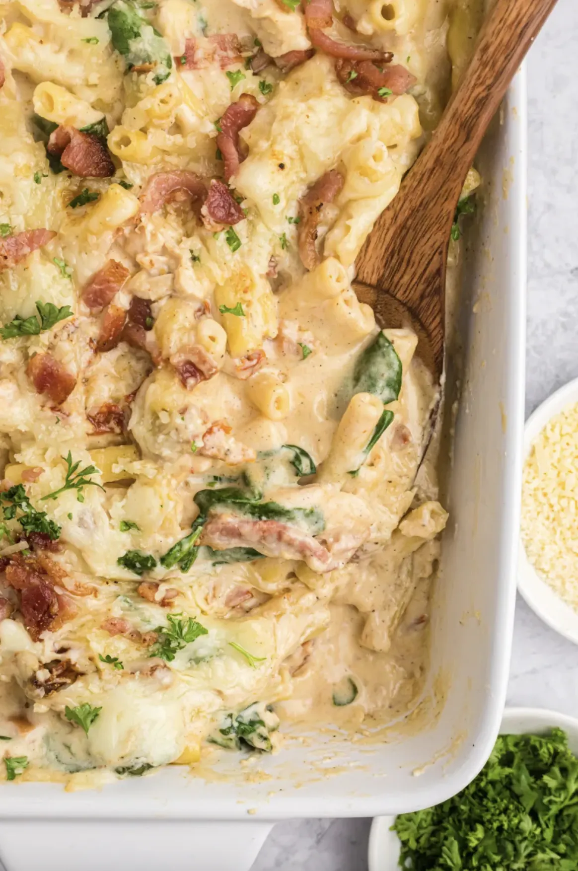 25 Easy Family Friendly Chicken Dinner Recipes from RecipeBoy.com creamy tuscan chicken pasta bake in a baking dish