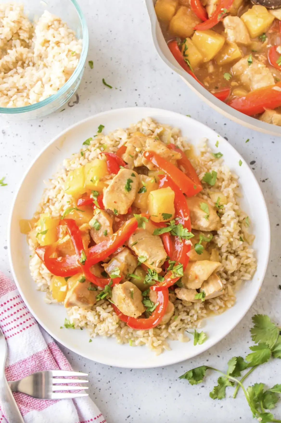 25 Easy Family Friendly Chicken Dinner Recipes from RecipeBoy.com pineapple ginger chicken stir fry in bowl