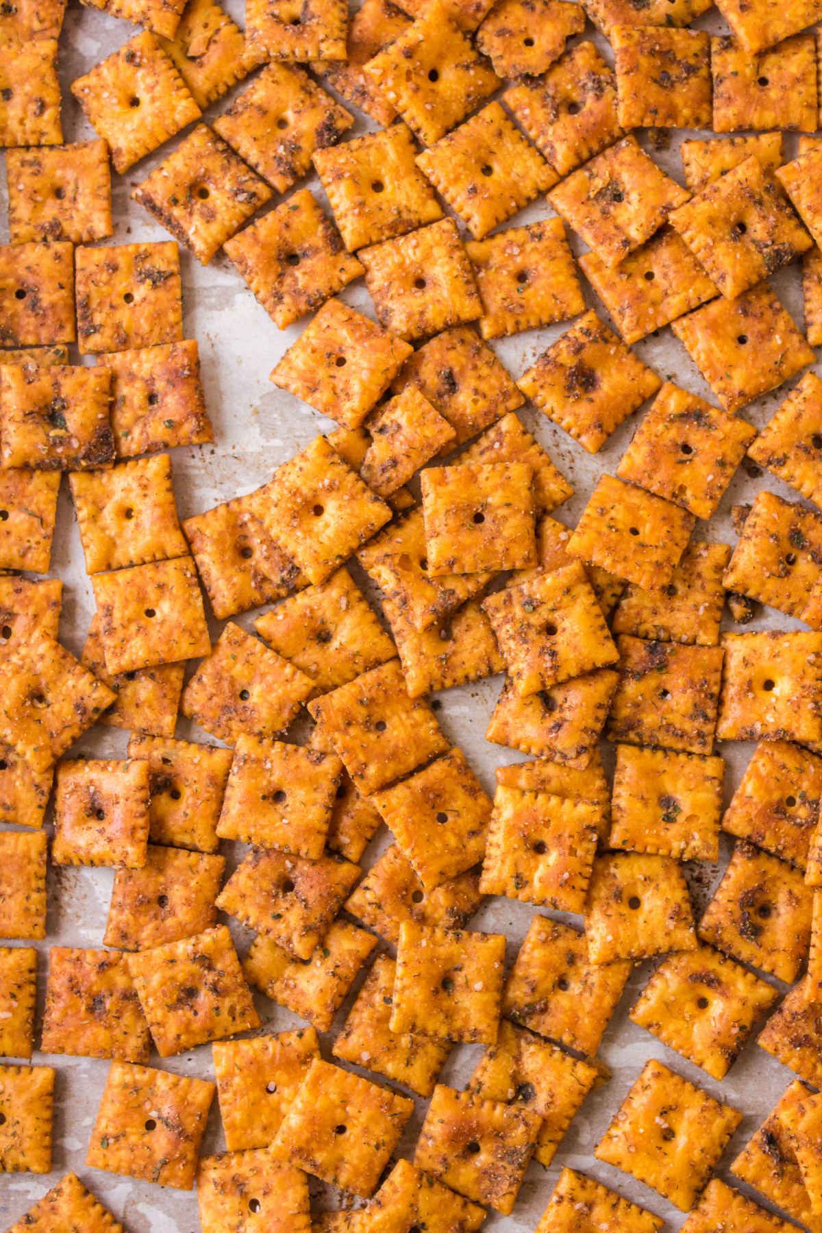 crack crackers on baking sheet