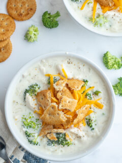 creamy chicken broccoli and rice soup over head shot of bowl