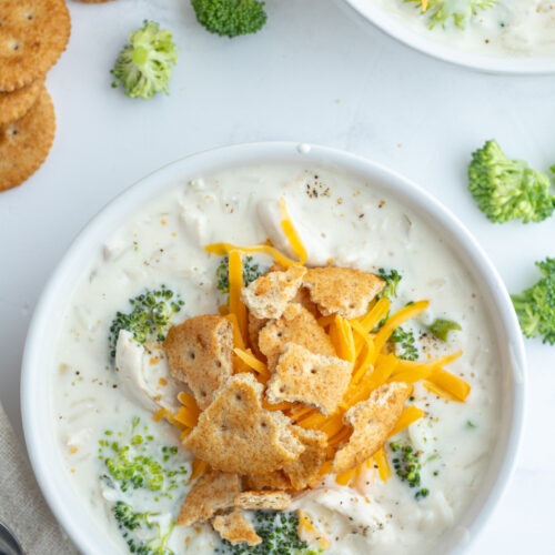 creamy chicken broccoli and rice soup over head shot of bowl