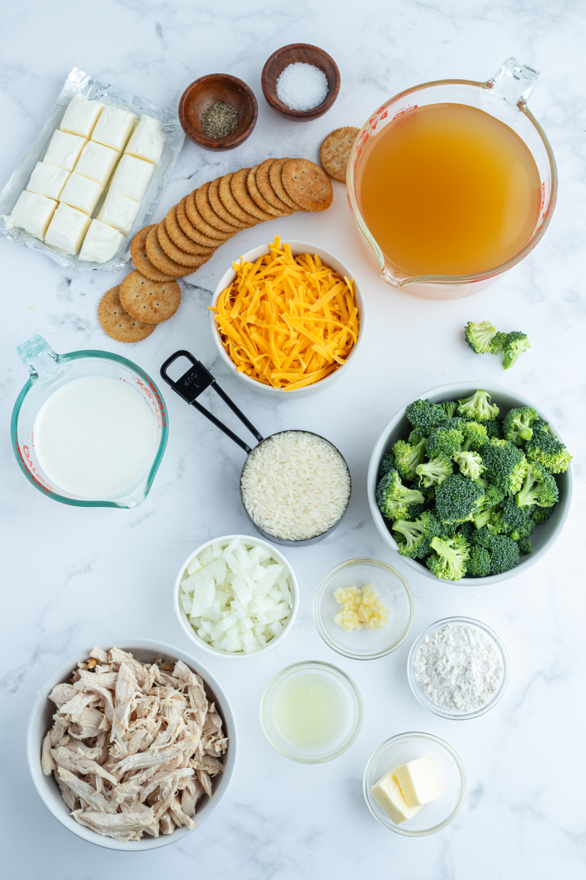 ingredients displayed for making creamy chicken broccoli and rice soup