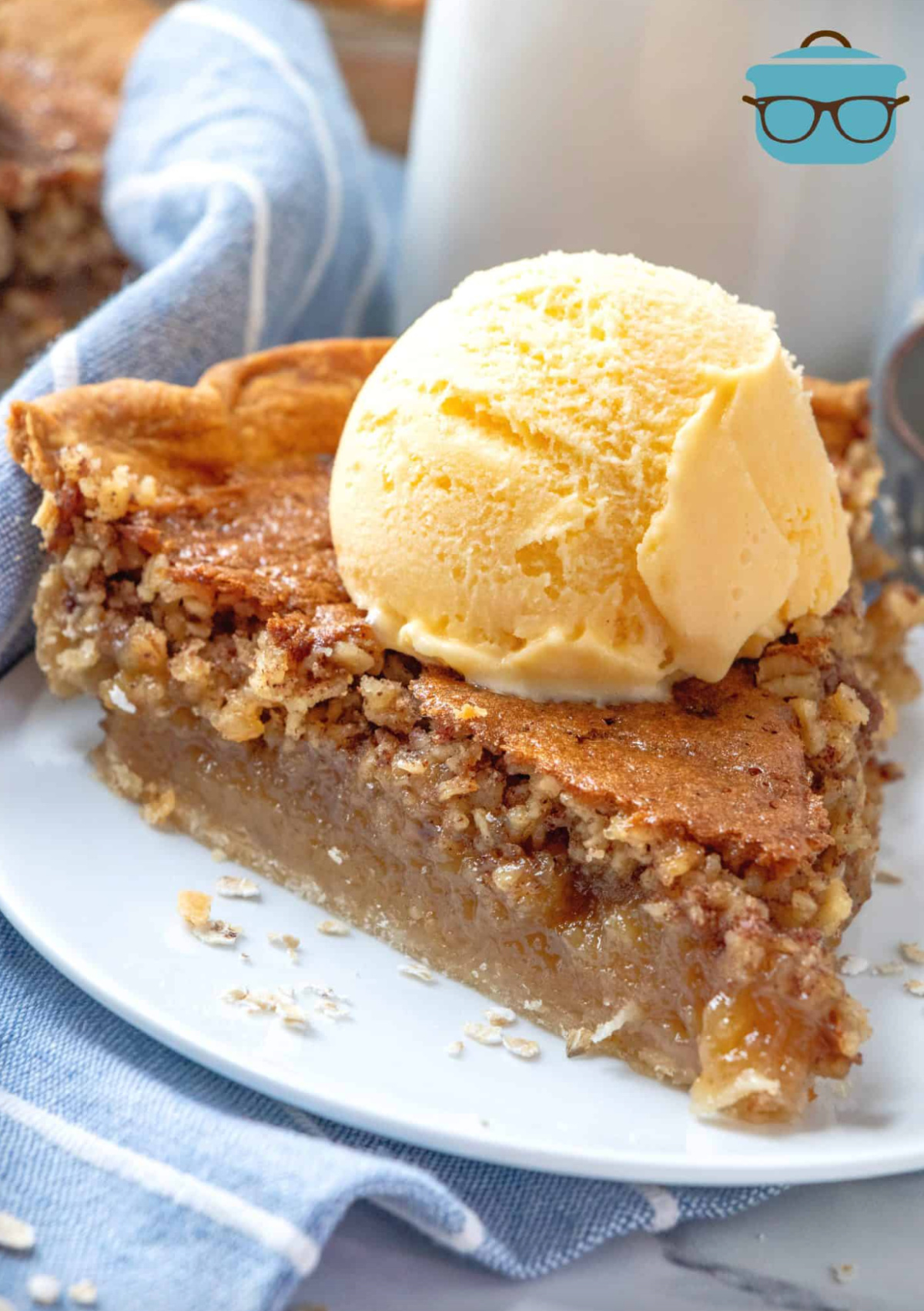 slice of grandma's best oatmeal pie on plate with ice cream