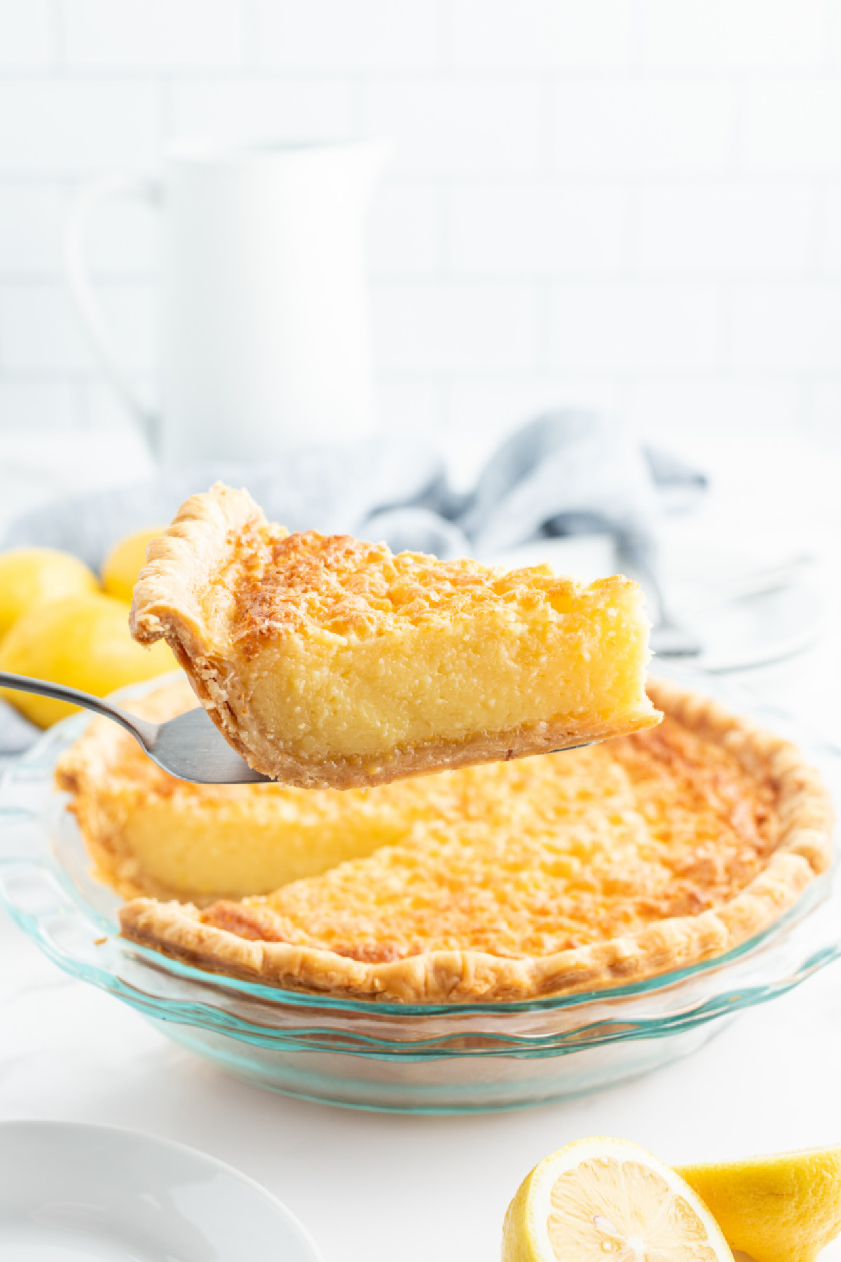 spatula taking out slice of lemon chess pie