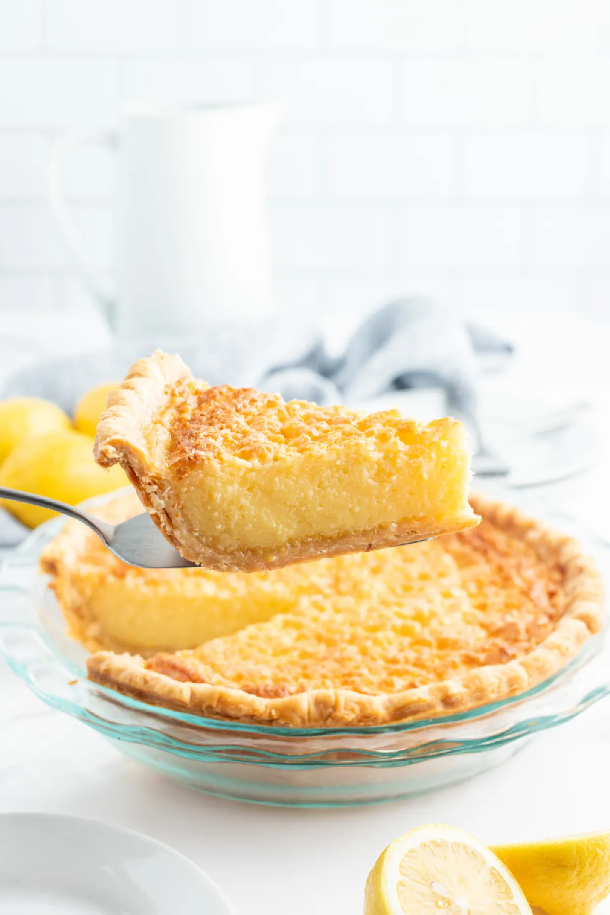 spatula taking out slice of lemon chess pie