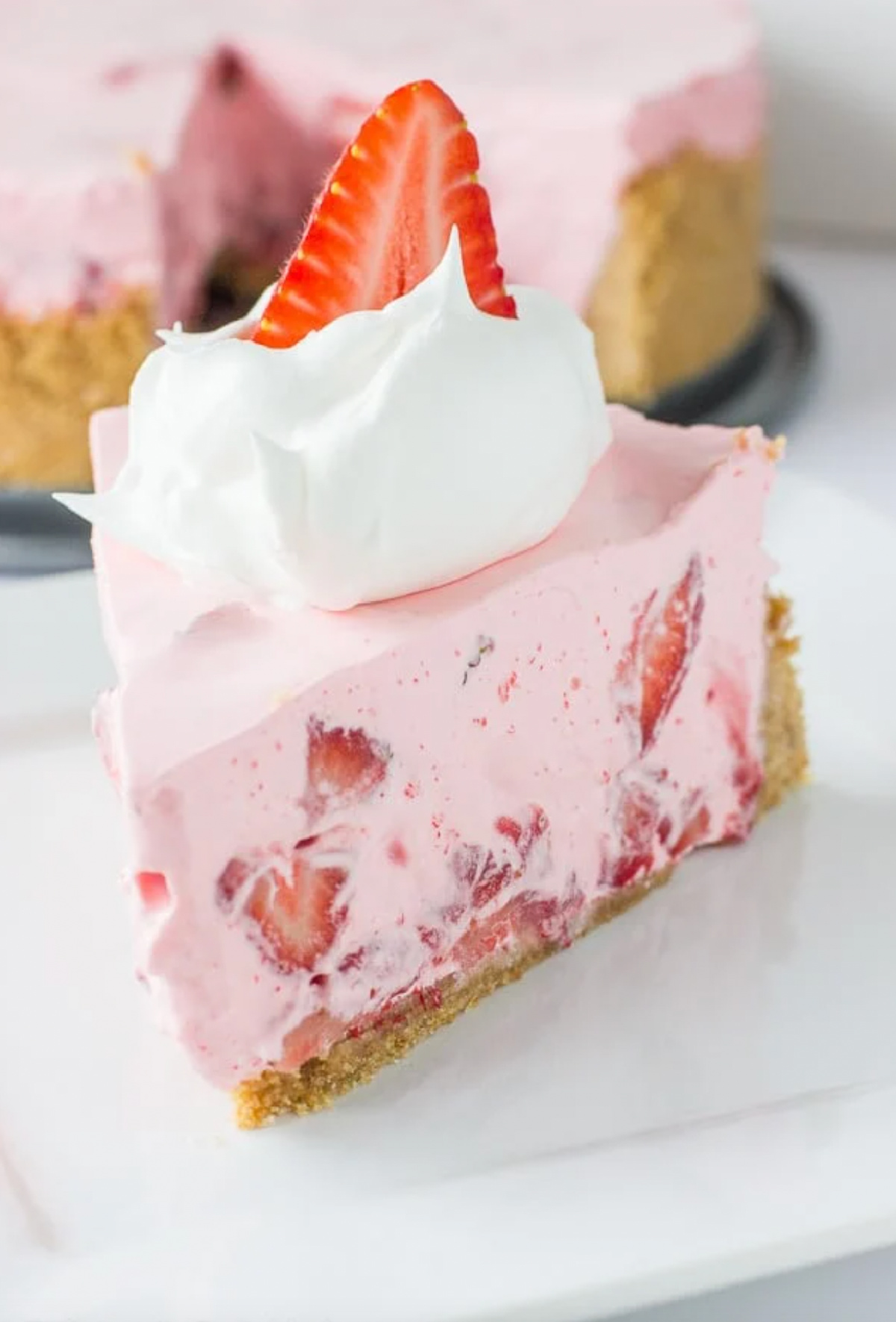 slice of no bake strawberry cream pie
