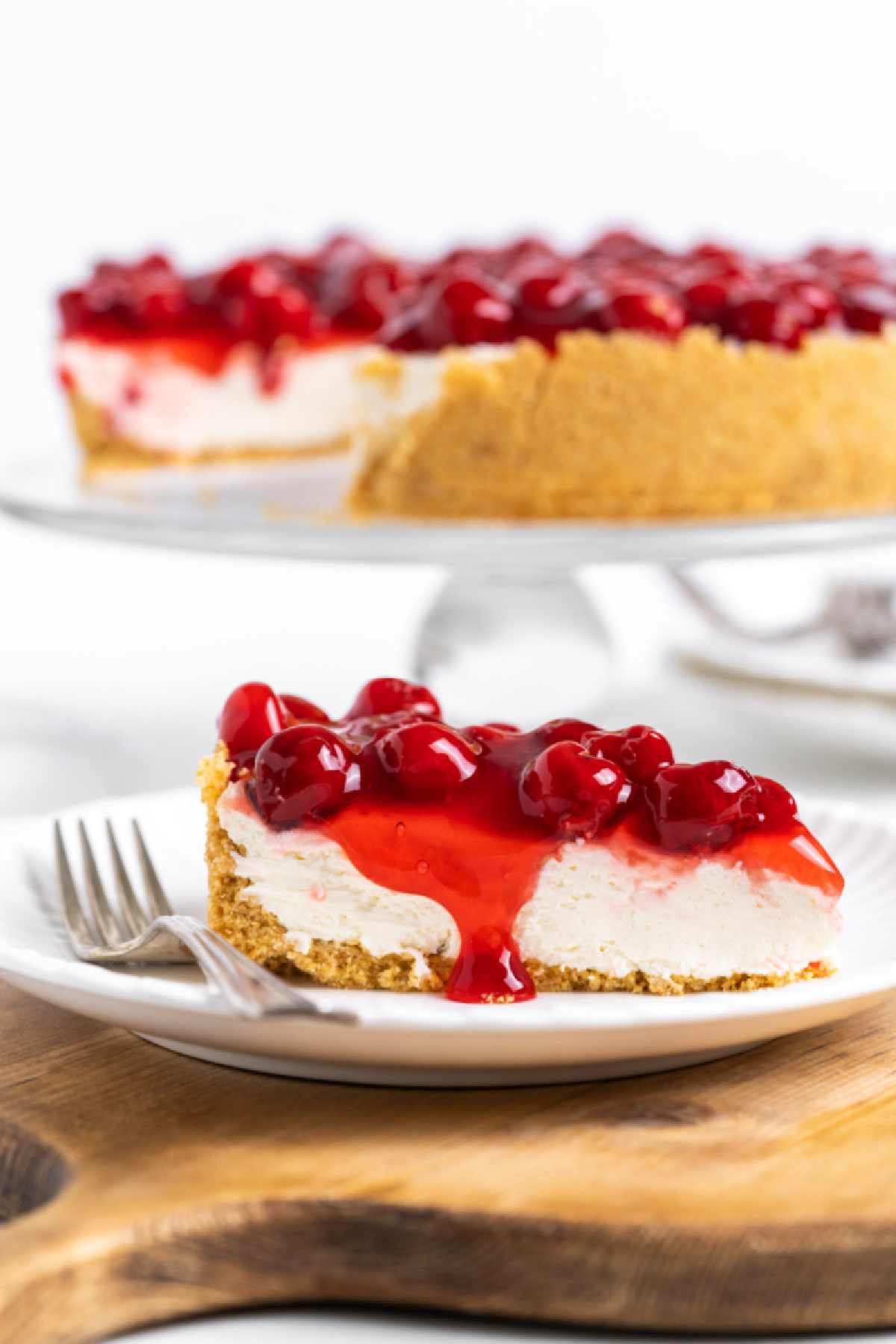 slice of no bake cherry cheesecake on plate