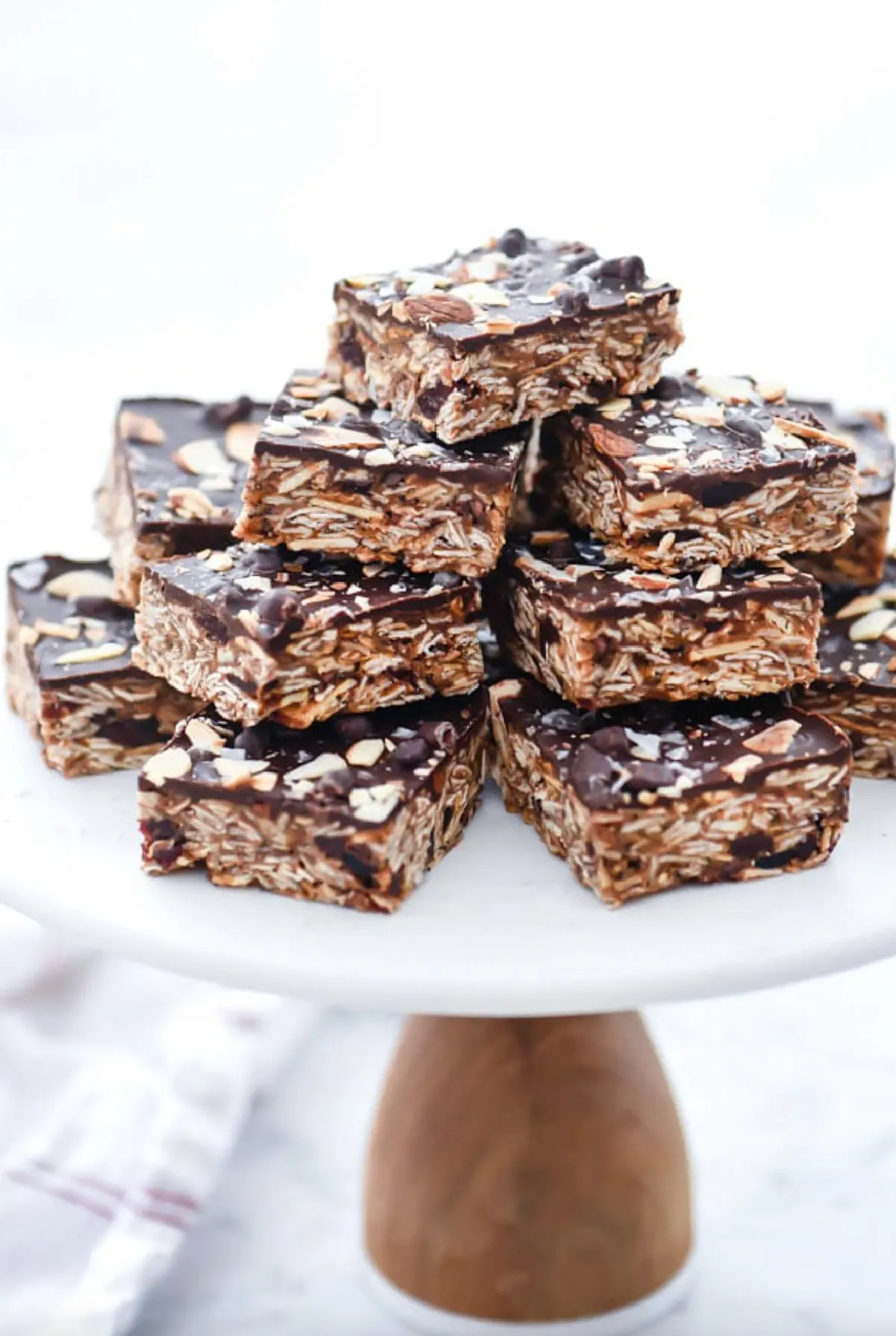 no bake cookie bars stacked on cake platter