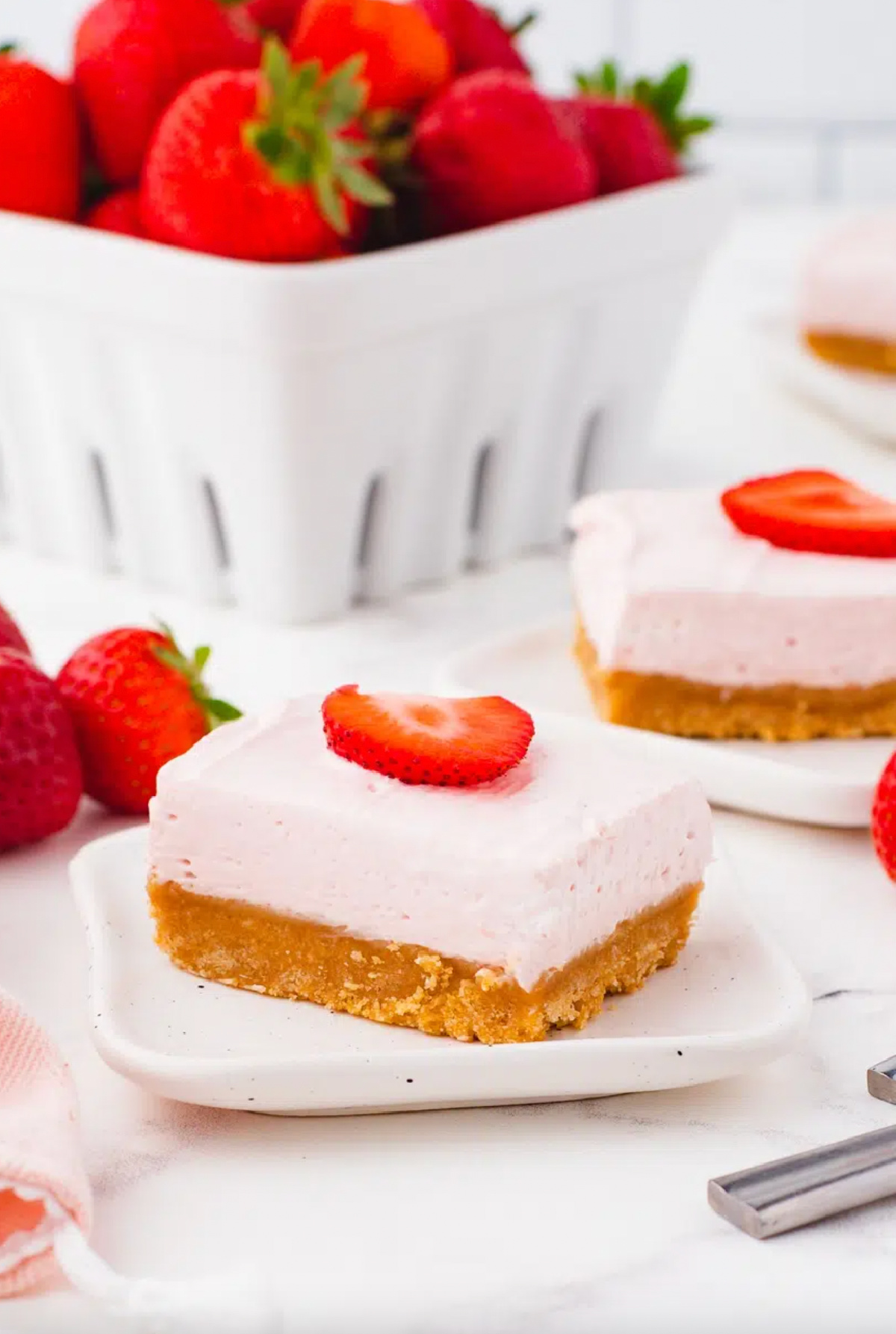 no bake strawberry cheesecake bar on plate