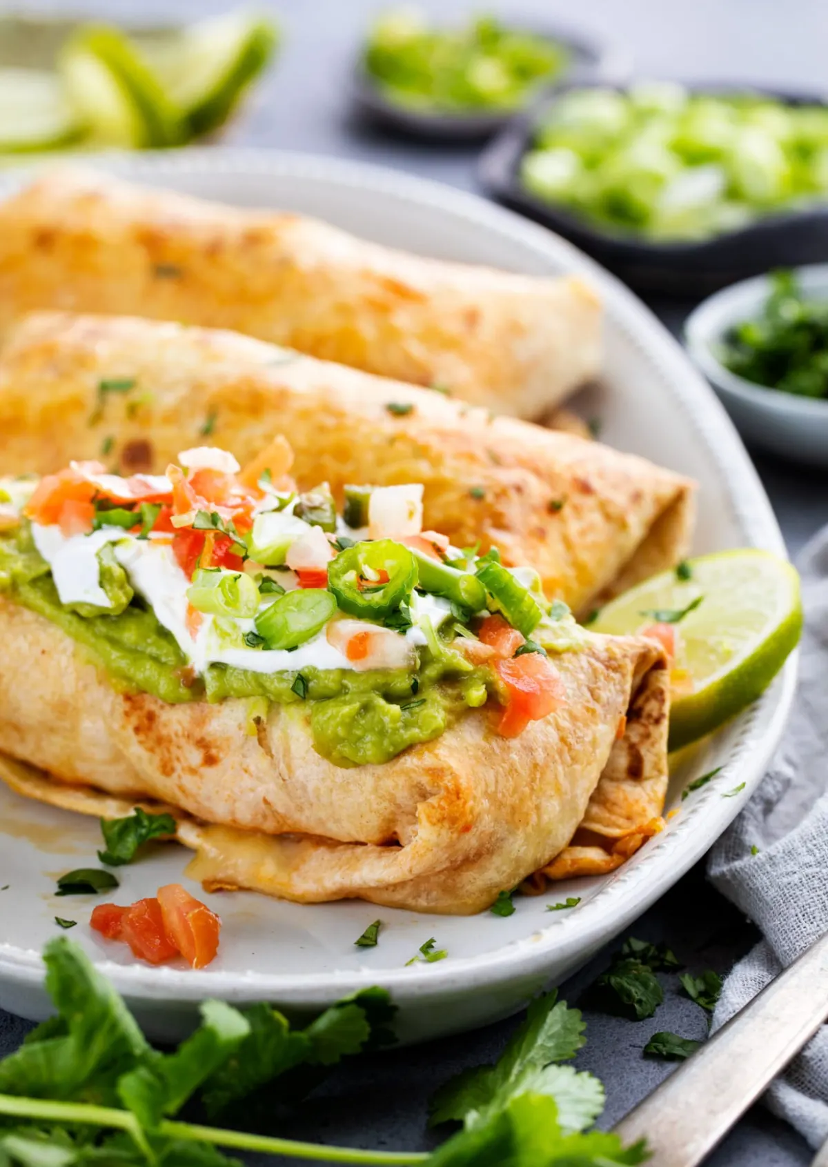 baked chicken chimichangas on platter