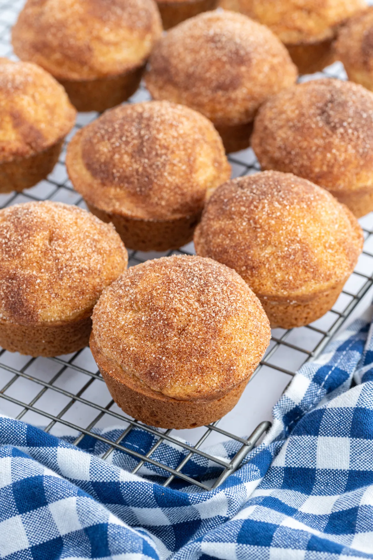 cinnamon sugar muffins on baking rack