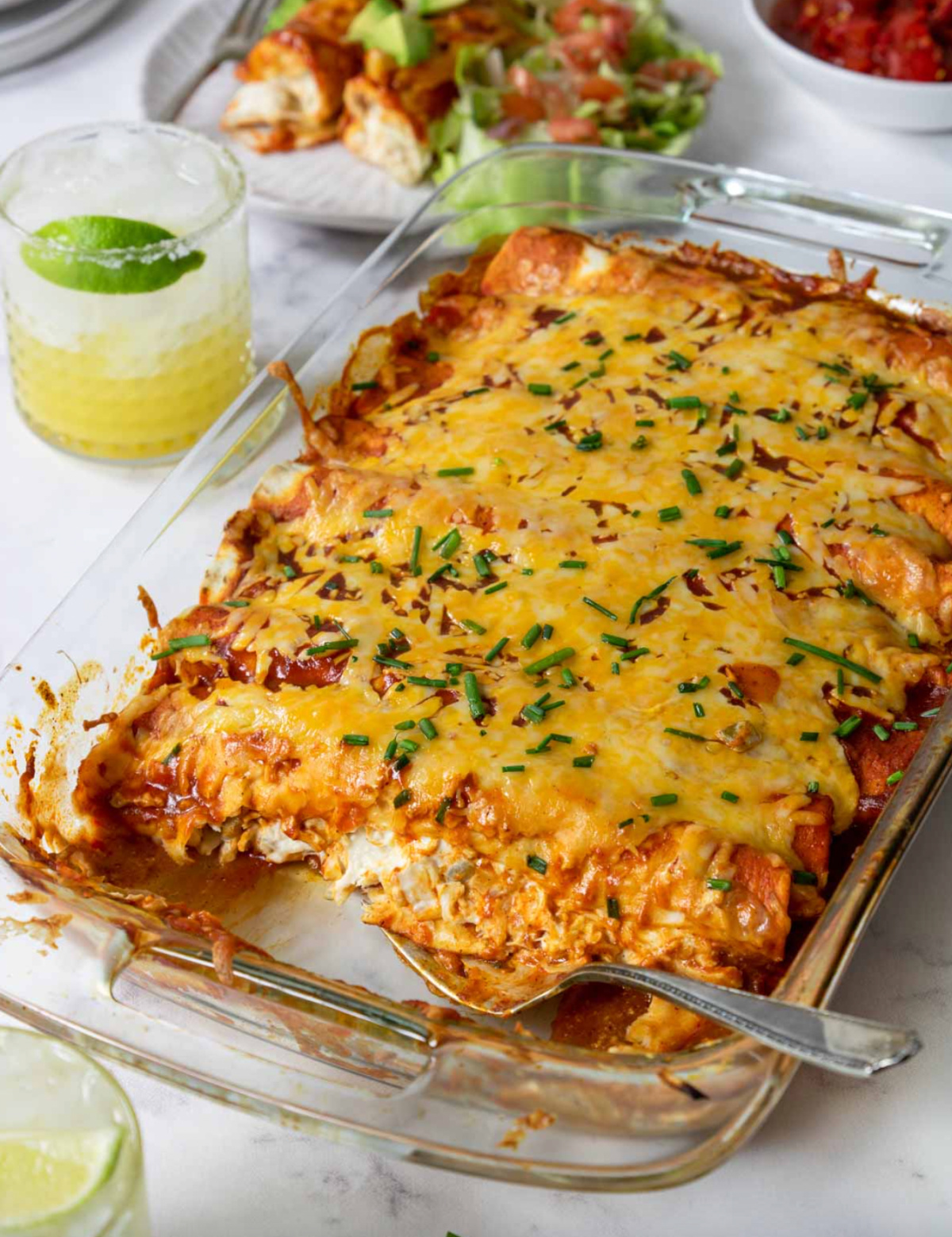 cream cheese chicken enchiladas in a pan