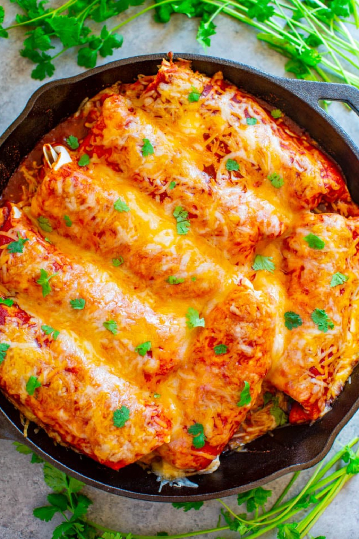 pan of loaded smothered beef burritos