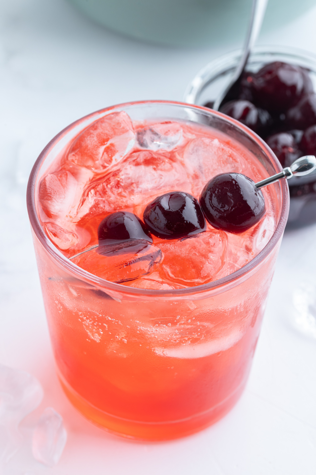 tequila shirley temple with cherry garnish