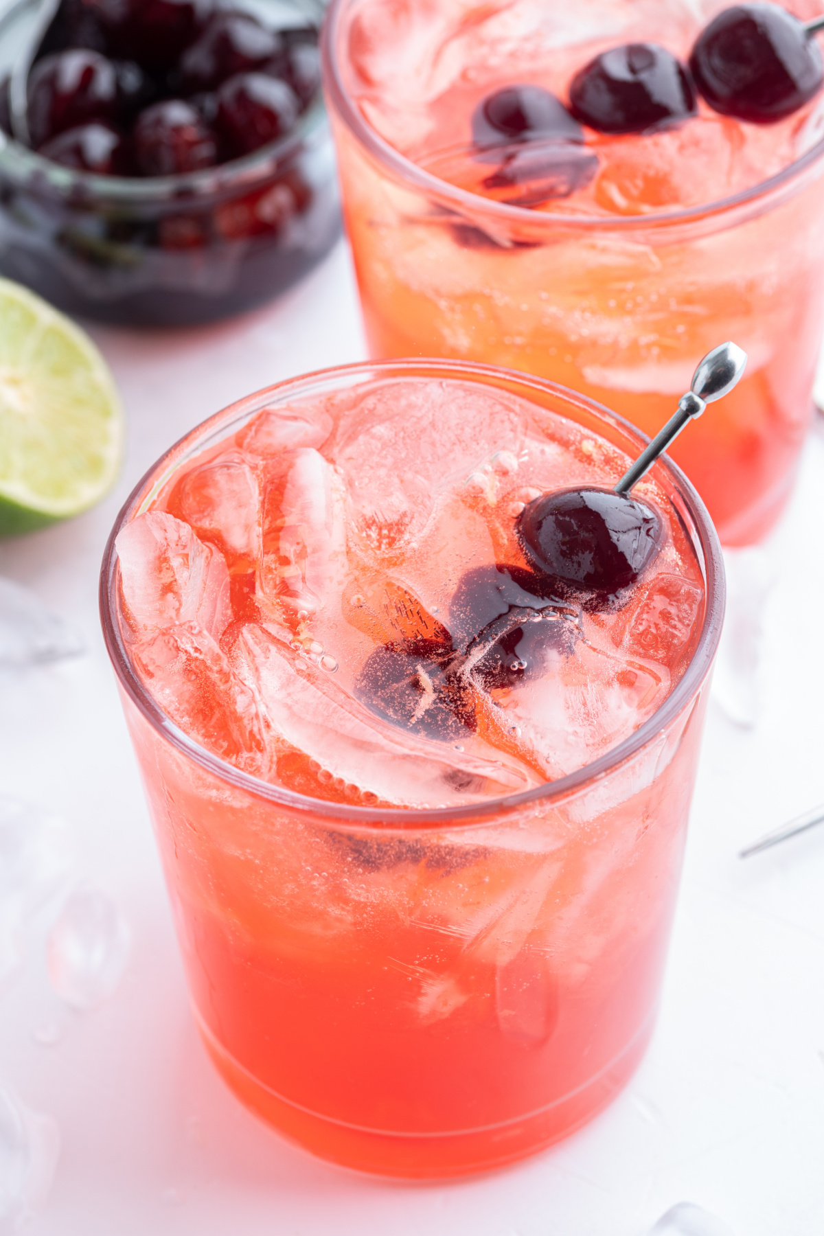 tequila shirley temples with cherry garnishes