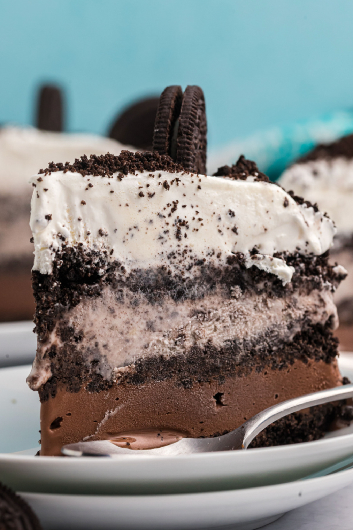 21 Impressive and Easy Summer Dessert Recipes collection on RecipeBoy.com slice of chocolate cookies and cream ice cream cake on plate