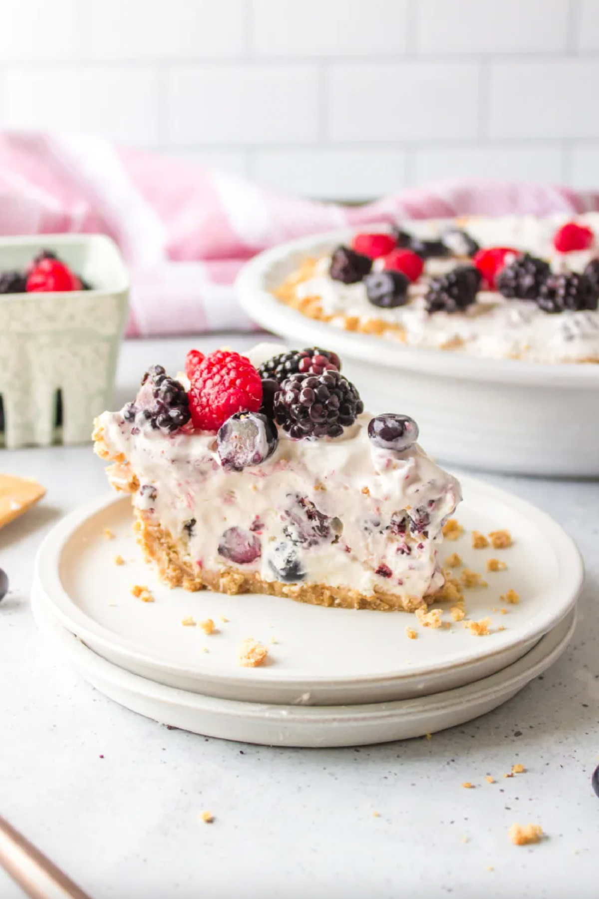 21 Impressive and Easy Summer Dessert Recipes collection on RecipeBoy.com slice of easy no bake berry pie on a plate