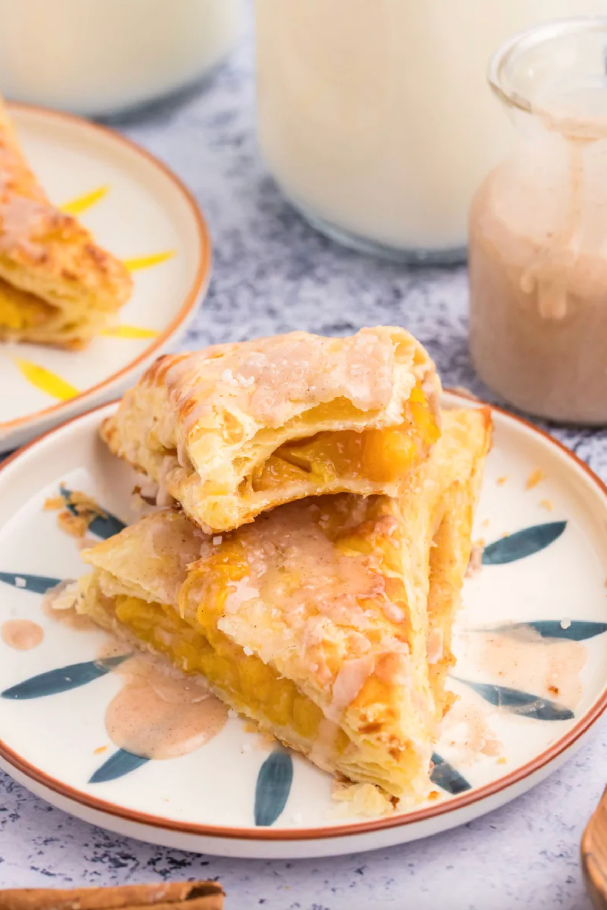 21 Impressive and Easy Summer Dessert Recipes collection on RecipeBoy.com easy peach turnovers on a plate
