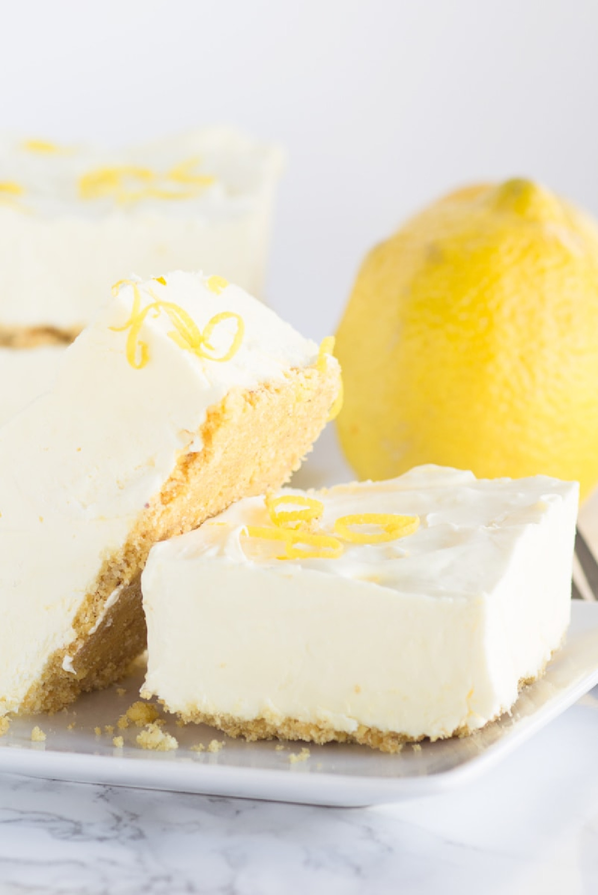 21 Impressive and Easy Summer Dessert Recipes collection on RecipeBoy.com frozen lemon cheesecake squares