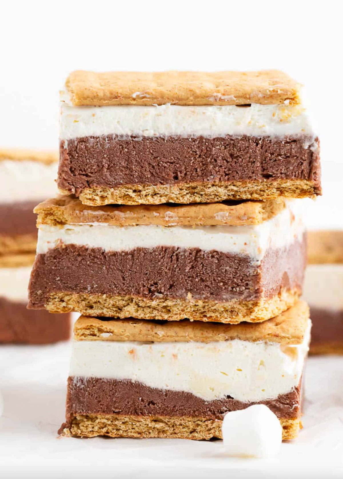21 Impressive and Easy Summer Dessert Recipes collection on RecipeBoy.com stack of three frozen s'mores