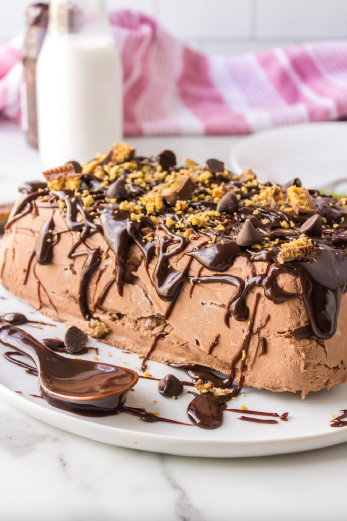 21 Impressive and Easy Summer Dessert Recipes collection on RecipeBoy.com loaf of fudgy chocolate peanut butter cup icebox cake on plate
