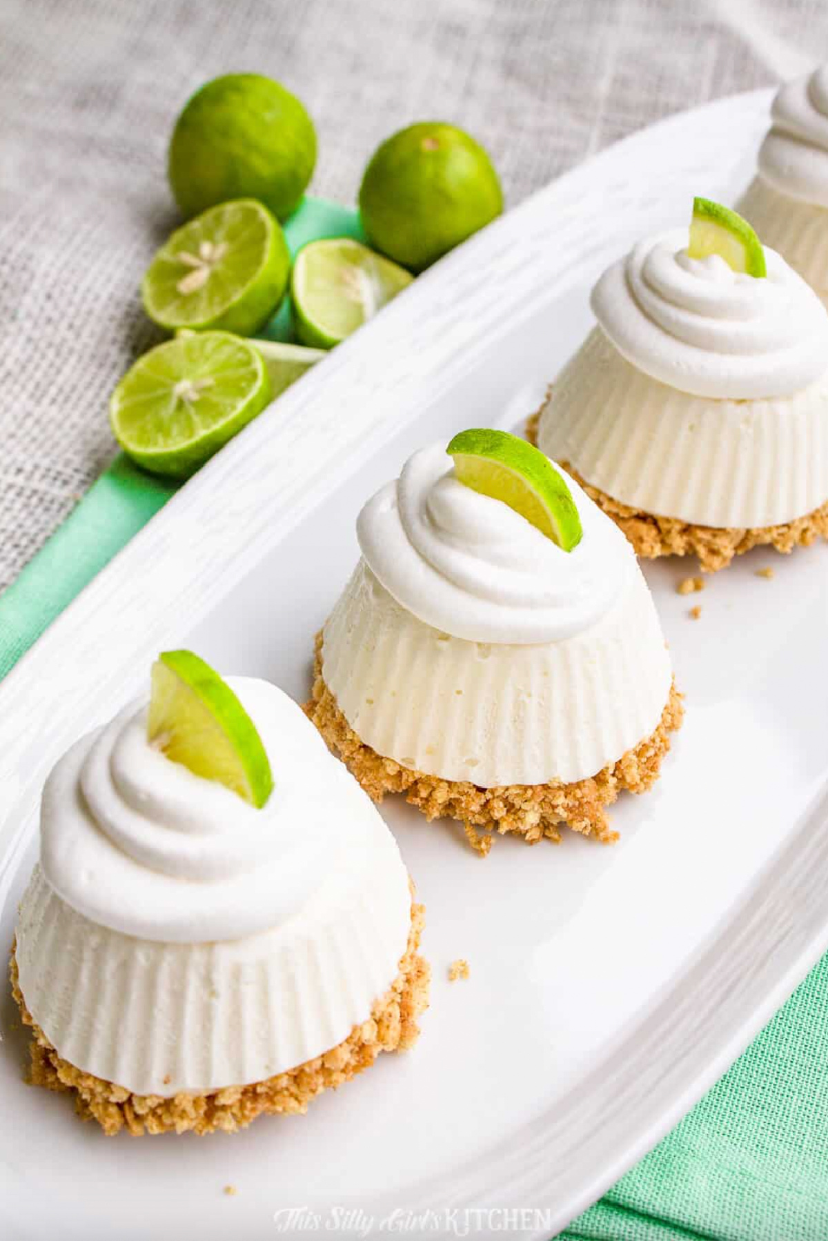 21 Impressive and Easy Summer Dessert Recipes collection on RecipeBoy.com three mini frozen key lime pies on a platter
