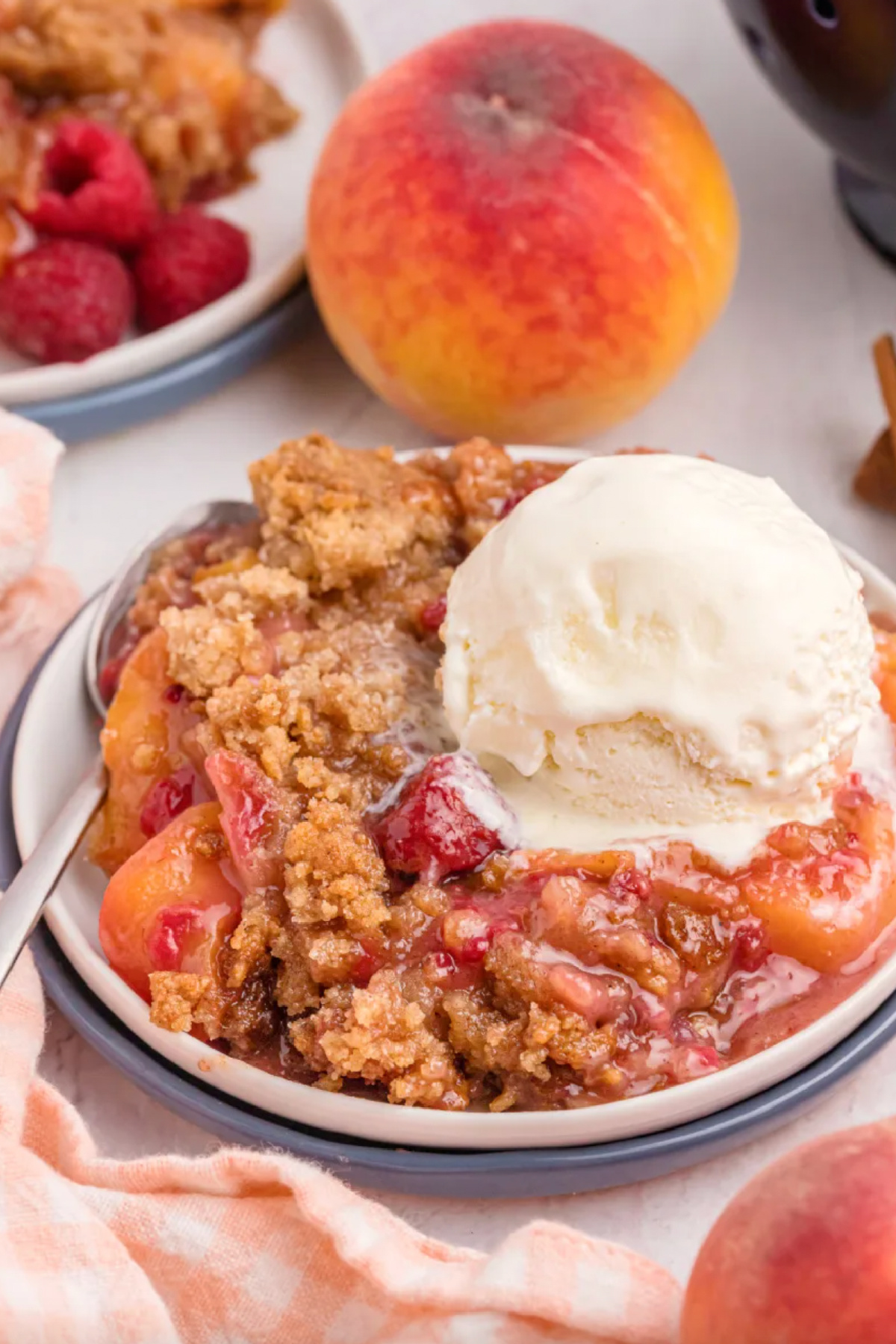 21 Impressive and Easy Summer Dessert Recipes collection on RecipeBoy.com raspberry peach crumble on a plate with ice cream