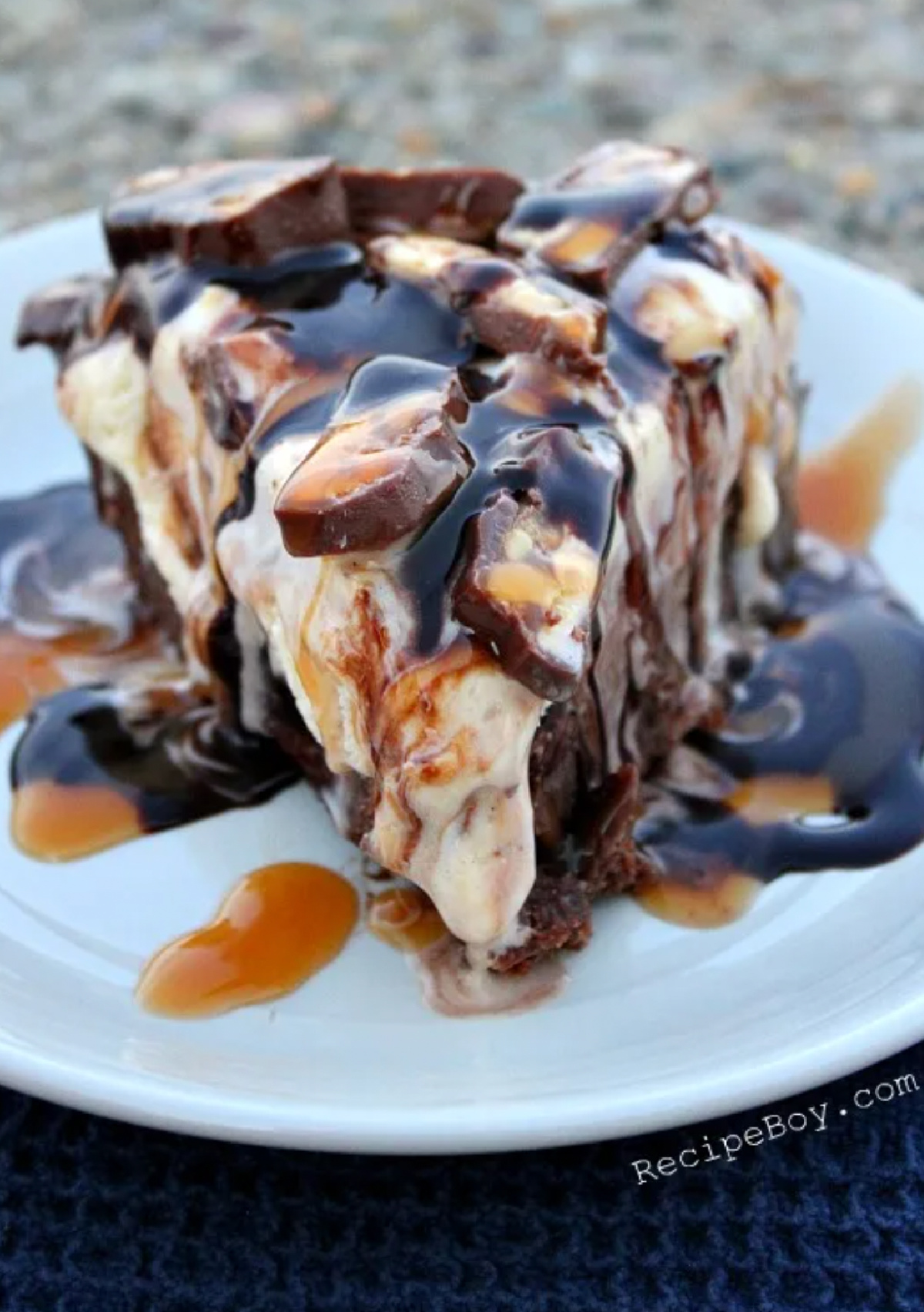 21 Impressive and Easy Summer Dessert Recipes collection on RecipeBoy.com slice of snickers ice cream brownie pie