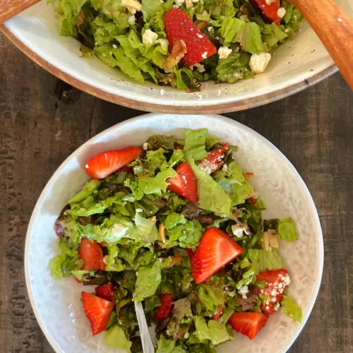strawberry almond salad in bowl and one serving in bowl