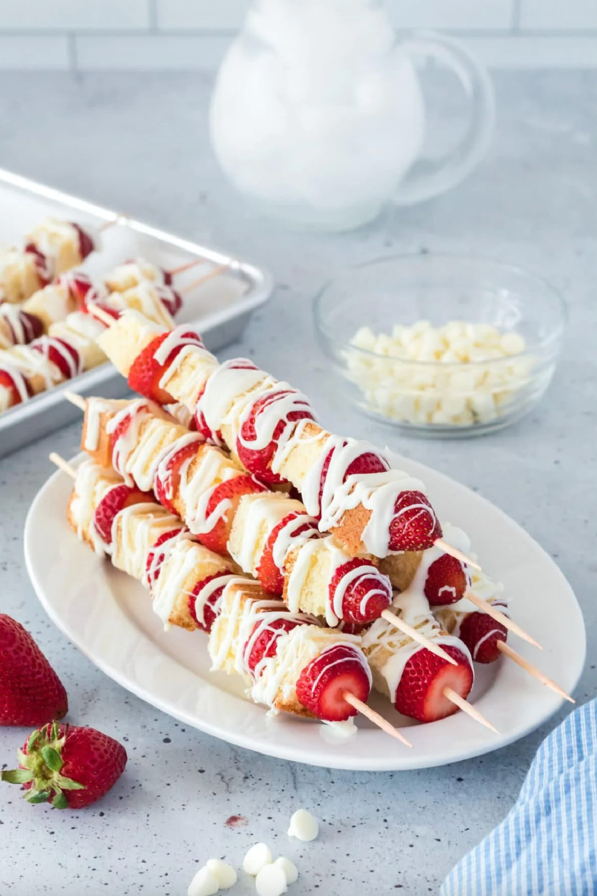 21 Impressive and Easy Summer Dessert Recipes collection on RecipeBoy.com strawberry shortcake kabobs on a plate