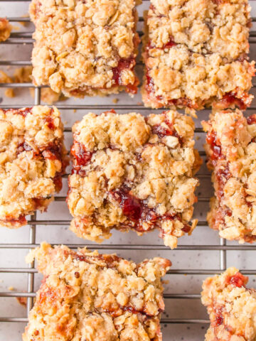 raspberry oatmeal bars on a cooling rack