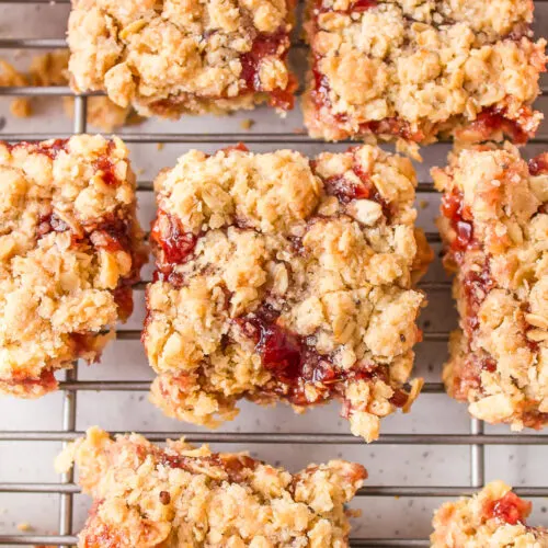 raspberry oatmeal bars on a cooling rack
