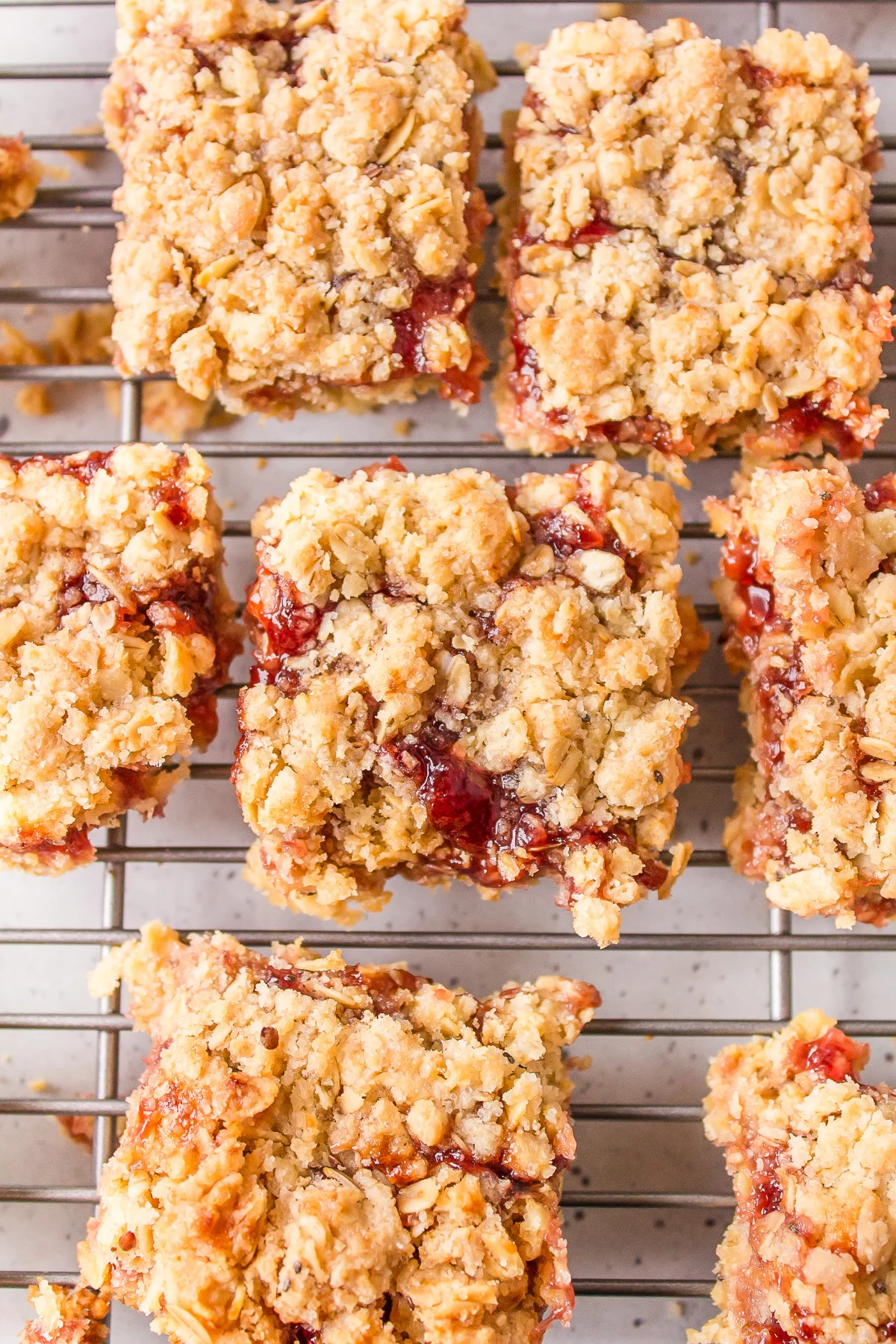 Raspberry Oatmeal Bars recipe from RecipeBoy.com raspberry oatmeal bars on a cooling rack