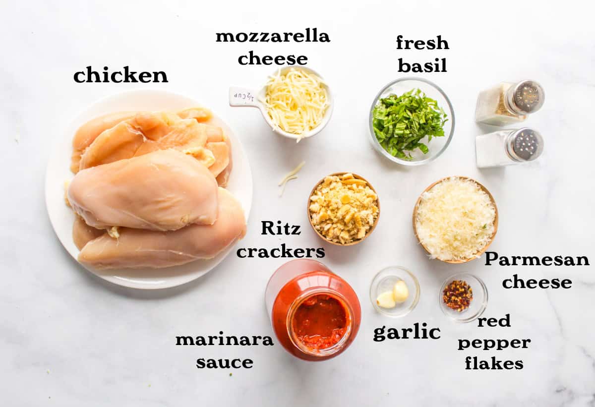 Make Chicken Parm the easy way! Baked Parmesan Chicken is juicy, cheesy, and topped with a buttery Ritz cracker crust. It’s loaded with flavor from garlic, Parmesan, and marinara — total family fave. ingredients displayed for making baked parmesan chicken