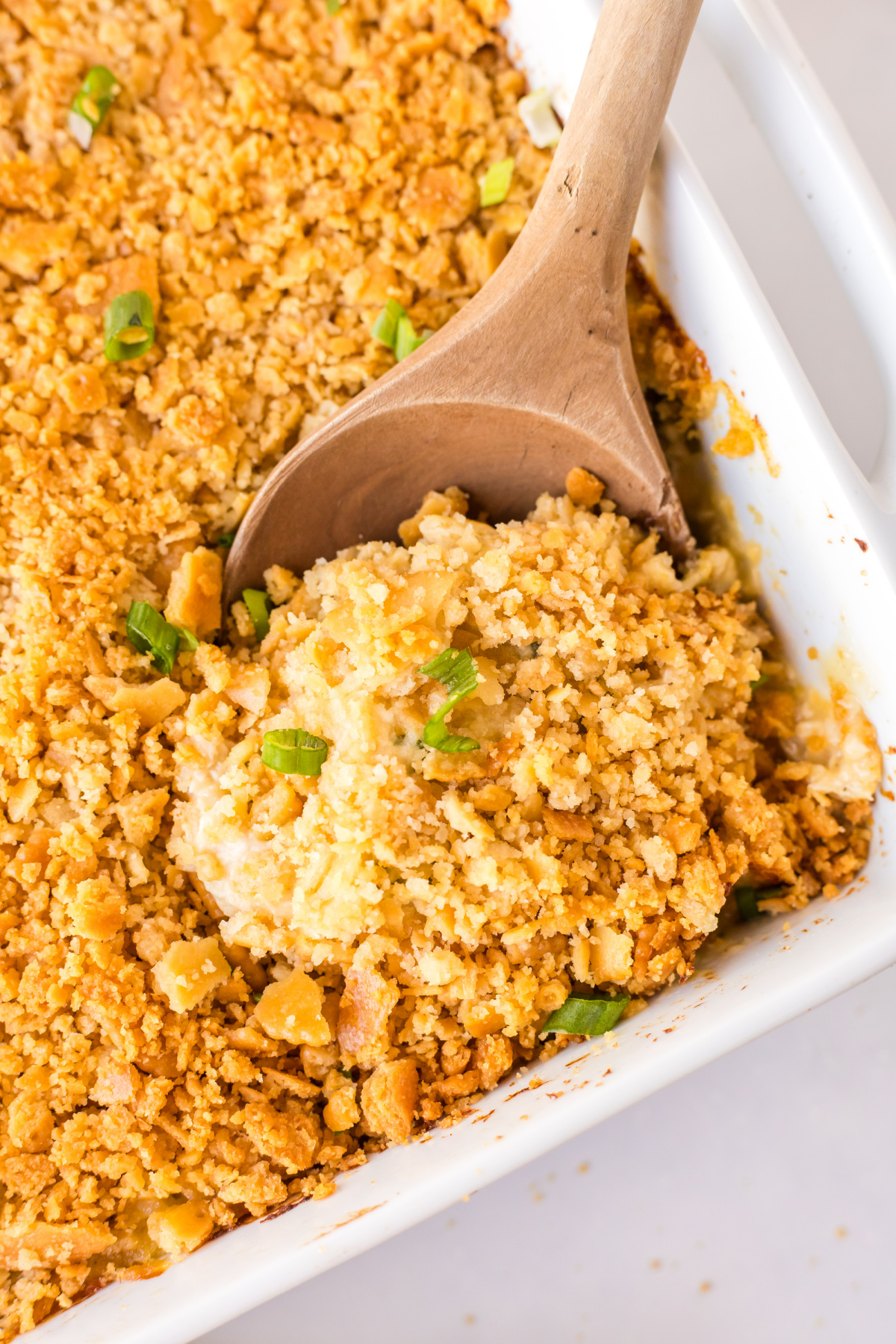 ritz chicken casserole in dish with spoon