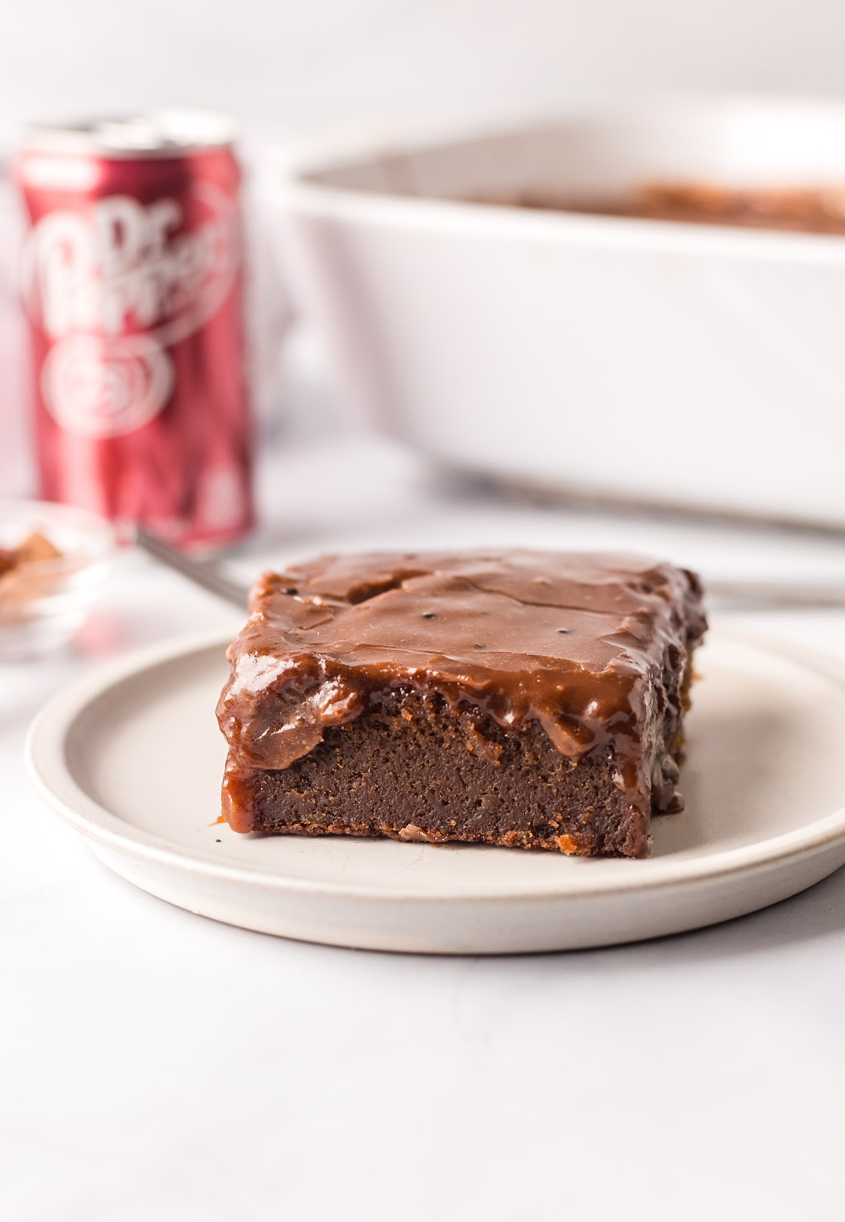 dr. pepper cake slice on plate