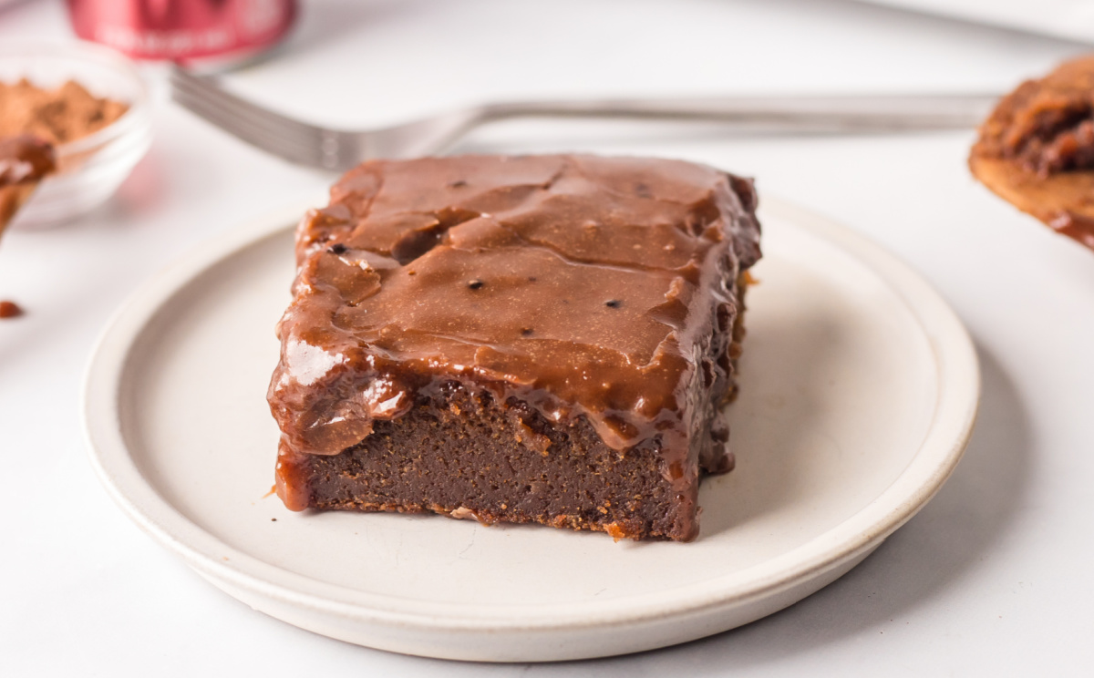 slice of dr. pepper cake on plate