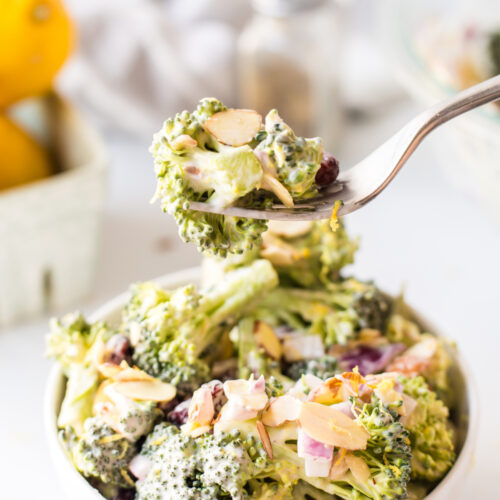 Fork full of broccoli crunch salad